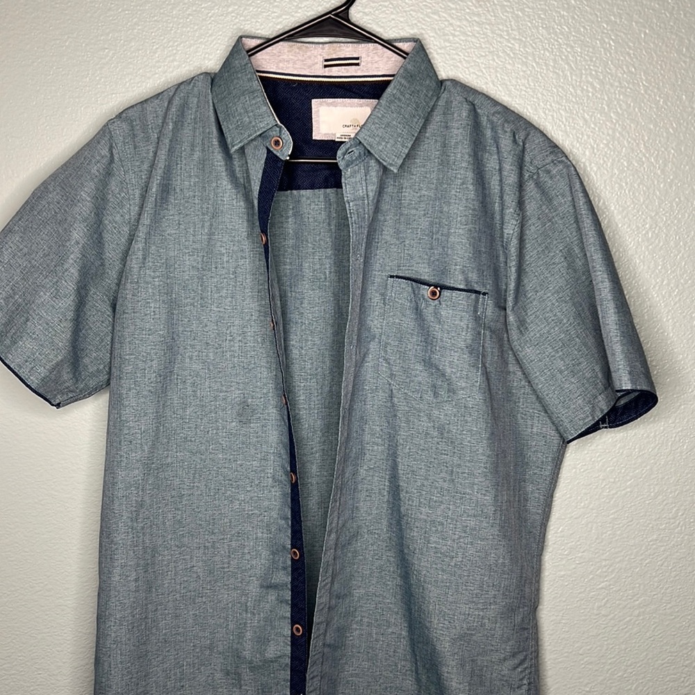 blue button down shirt